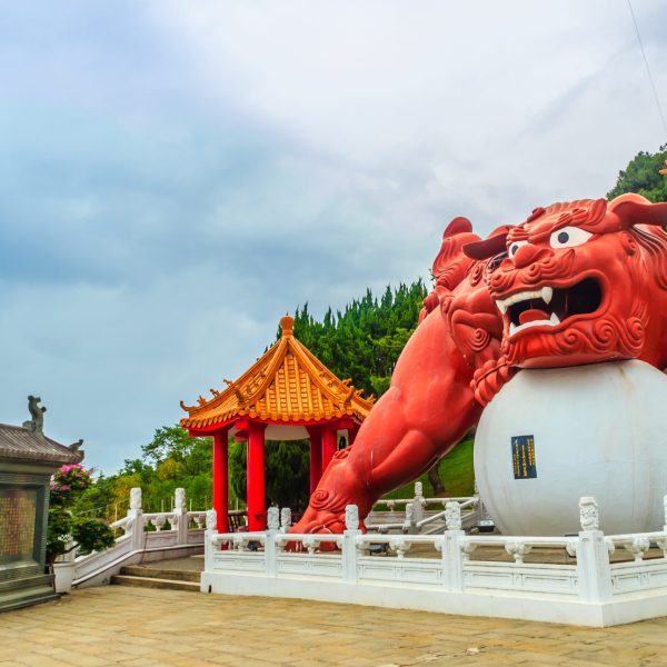 A,chinese,guardian,lion,with,the,ball,can,be,seen